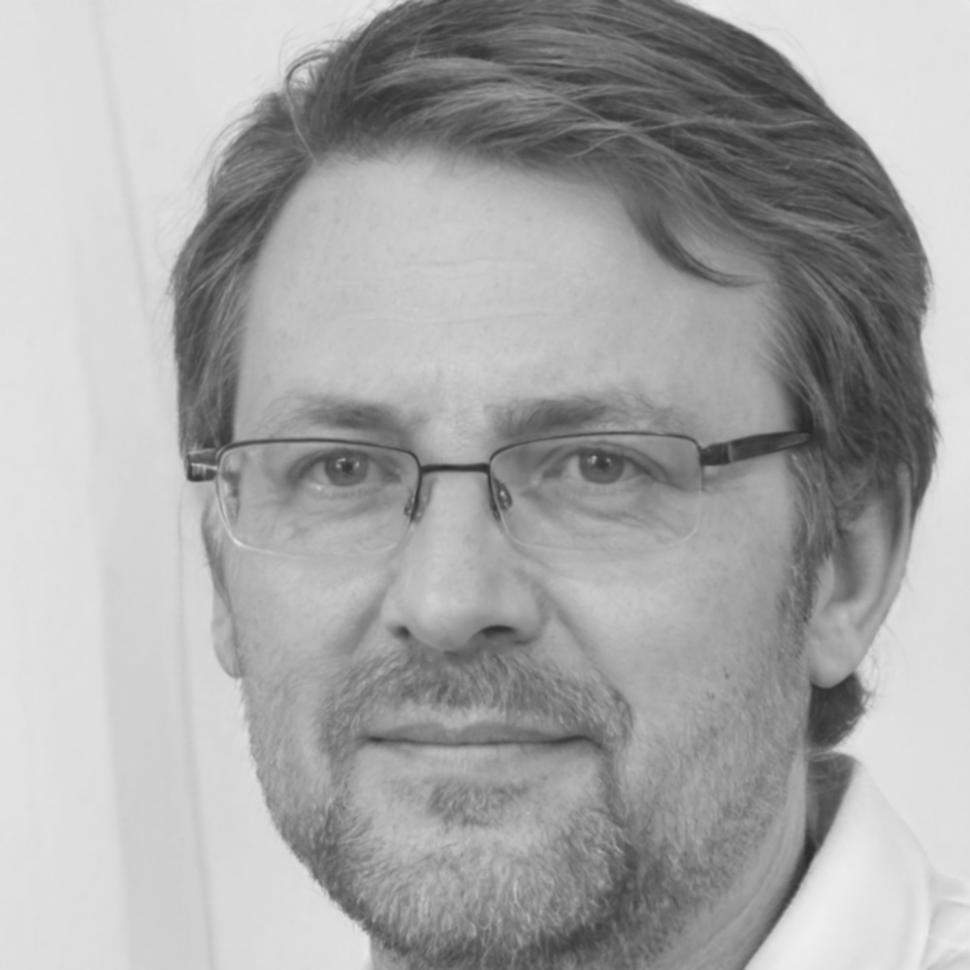 Professional headshot of senior editor Jasper Thornwick